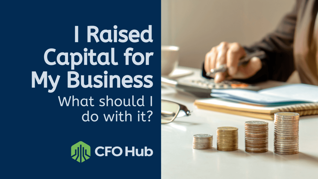 Image featuring the text "I Raised Capital for My Business. What should I do with it?" on a blue background with the CFO Hub logo. On the right, a person is using a calculator with a notebook, glasses, a small plant, and stacks of coins in the foreground, symbolizing smart investment strategies.